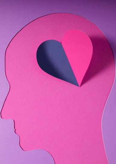 Outline of head with heart opening where brain would be